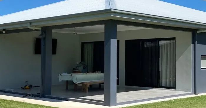 Before: an open alfresco, closed in with aluminium shutters