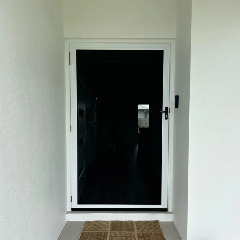 White-framed Invisi-Gard security door