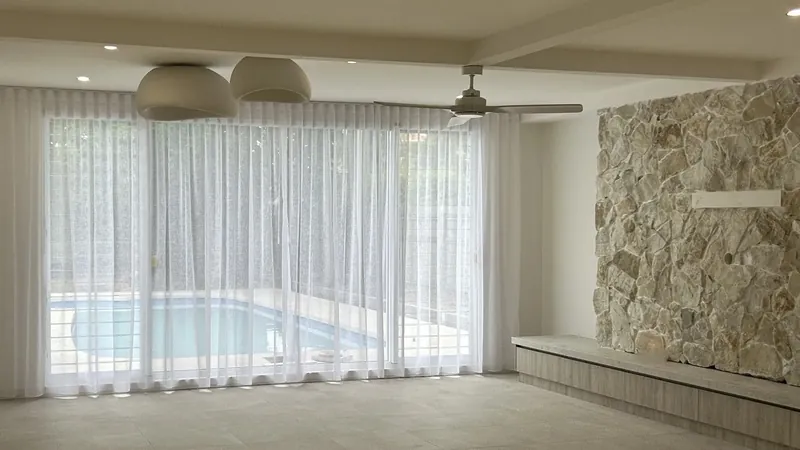 What are S-Fold curtains, and how do they work?