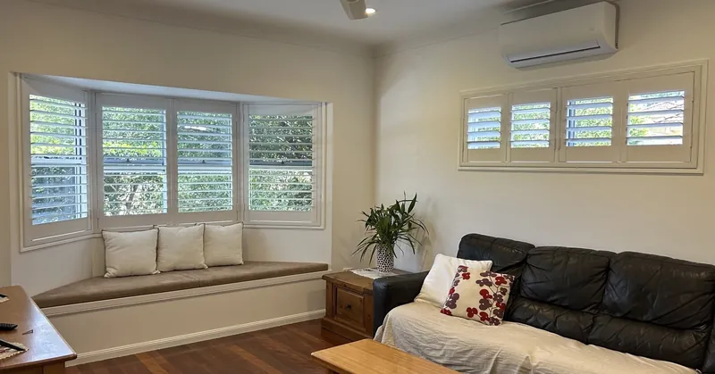 Plantation shutters, bay window